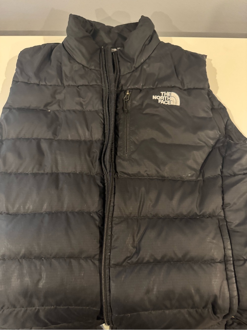 The North Face Black Puffer Vest with Chest Zip